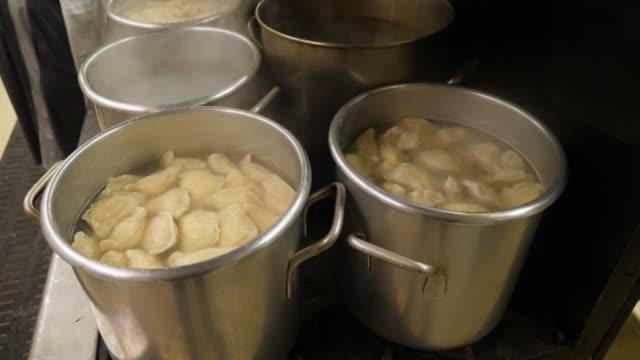 High-Angle-View-of-Pots-Boiling-Pierogies
