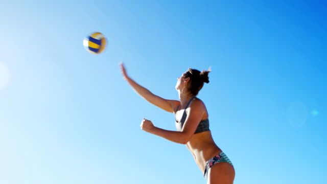 Female-volleyball-player-playing-volleyball-4k