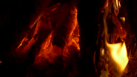 Wood-burning-in-the-fireplace,-slow-motion,-close-up