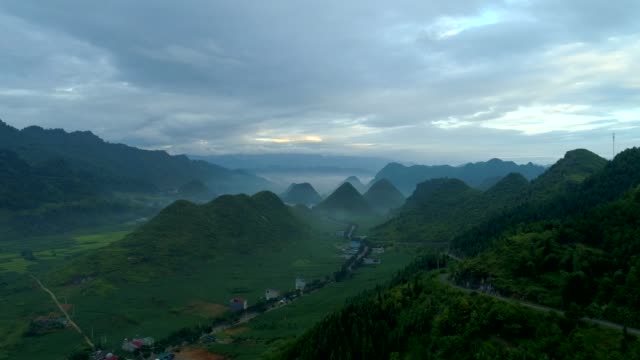 Aerial-view-4k-video-by-drone.-morning-mountain-in-Tam-Son-town,-Quan-Ba-District,-Ha-Giang.