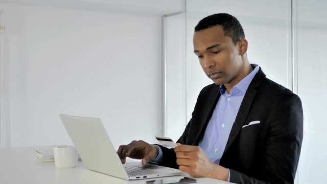 Successful-Online-Shopping-with-Credit-Card,-Payment-by-Casual-Afro-American-Businessman