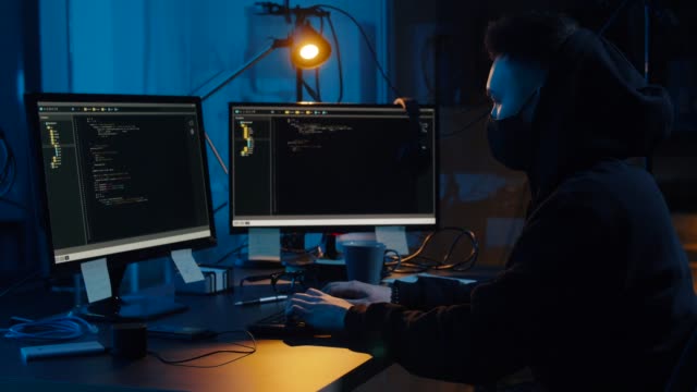 hacker-using-computer-for-cyber-attack-at-night