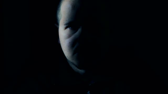 Portrait-of-Sad-man-bald-in-the-darkness