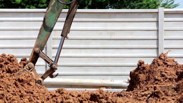 Excavadora-retroexcavadora-trabajan-en-construcción