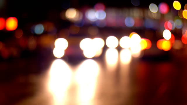 Ciudad-de-noche-Defocused-semáforos