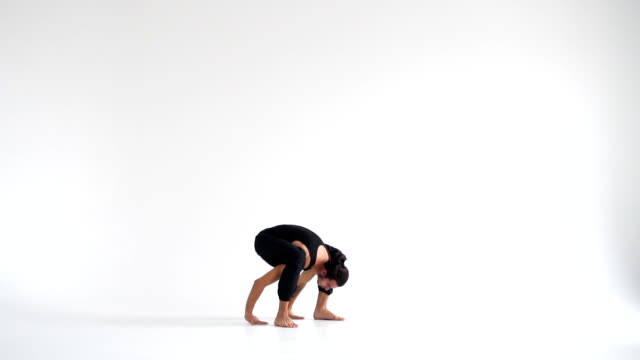 Man-practicing-yoga-asanas