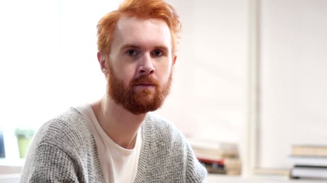 Portrait-of-Serious-Man-with-Red-Hairs