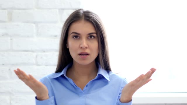 Portrait-of-Woman-Gesturing-Frustration-and-Anger