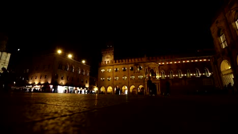 People-go-through-an-old-night-city,-Europe,-Prague