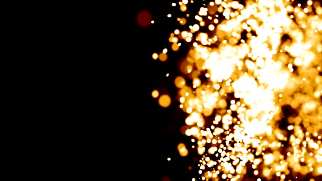 Fire-Colored-Cinematic-Looking-Particles-With-Turbulence-Motion-Moving-In-Front-Of-Camera-With-Shallow-Dof-On-Black-Background