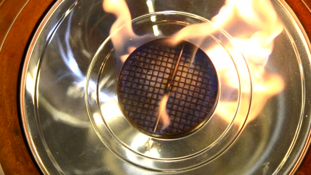 Modern-bio-fireplot-on-ethanol-gas-close-up