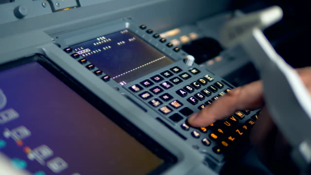 A-pilot-dials-on-a-dashboard,-close-up.
