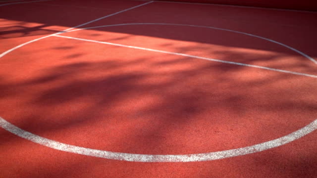 Streetball-Court-mit-weißen-Linien-auf-rotem-Hintergrund