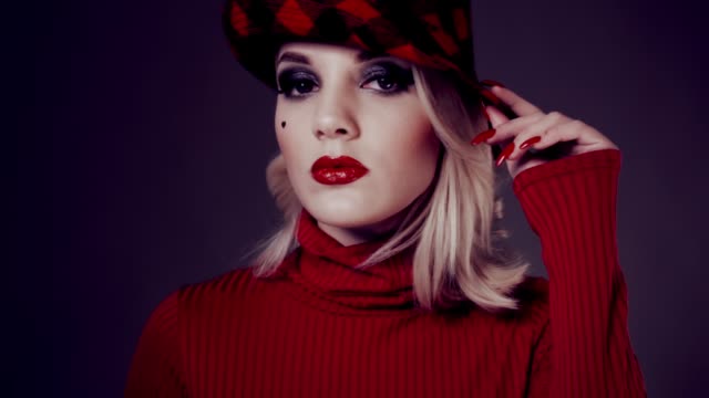 Woman-in-red-hat-with-red-lips.