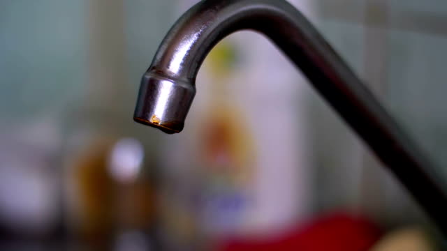 Water-Driping-from-the-Tap-into-a-Sink.-Slow-Motion