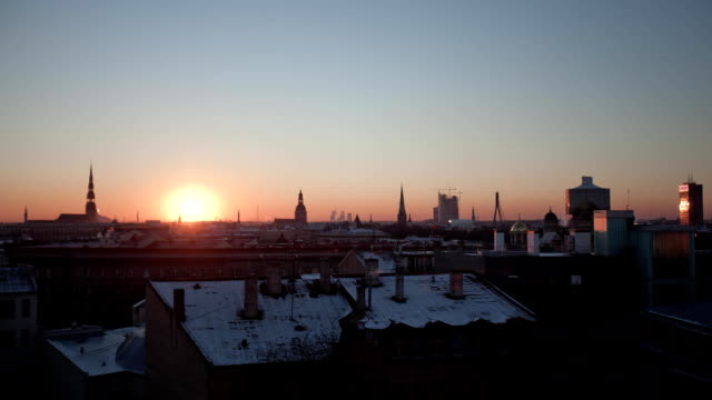 Riga-Down-Town-Cathedral-Dome-sunset-timelpse,-winter-time-lapse