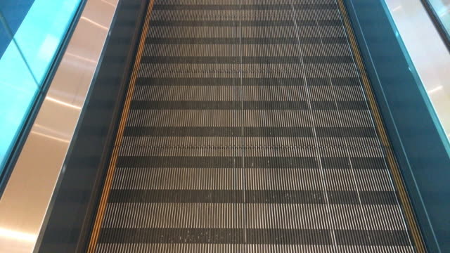 An-escalator-is-moved-constantly-from-below-to-above
