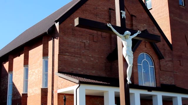 Modern-catholic-church.-Jesus-on-cross.-Church-building-exterior