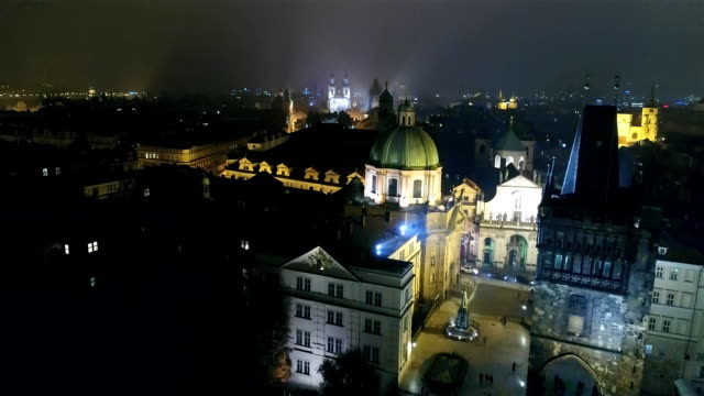 Night-panorama-of-Prague,-Panoramic-view-from-the-air-to-St.-Vitus-Cathedral-in-Prague,-lights-of-the-night-city,-Prague