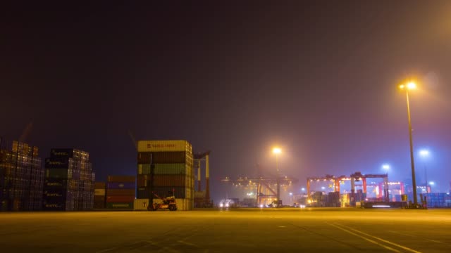 night-illuminated-shenzhen-city-working-traffic-port-industrial-panorama-4k-time-lapse-china