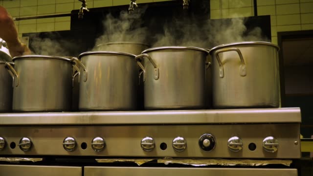 Pots-on-a-Stove-in-an-Industrial-Cafeteria
