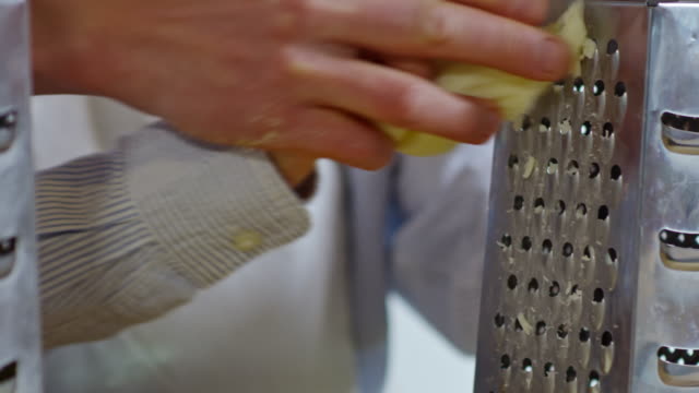 Little-Boy-Learning-to-Use-Grater