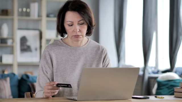 Online-Shopping-with-Credit-Card-on-Laptop