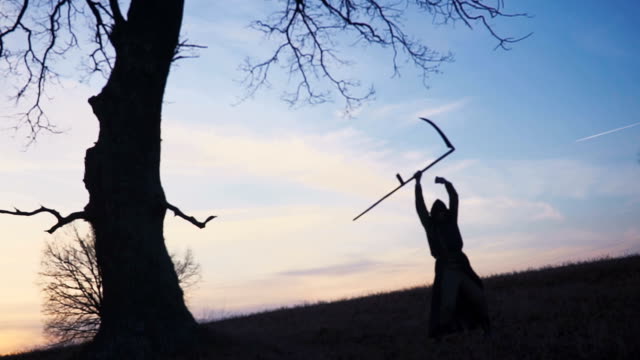 Grim-Reaper-sunset-silhouette.-concept-of-death.
