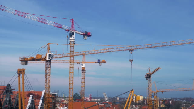 Big-construction-site-with-cranes-panorama-in-4k-slow-motion-60fps
