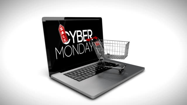 Trolley-with-boxes-on-laptop-displaying-cyber-Monday-sale-sign