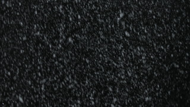 Elemento-de-vfx-Navidad-tormenta-de-nieve-en-la-pantalla-en-negro.