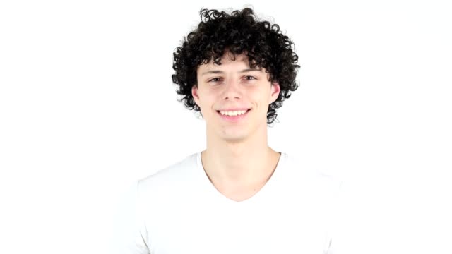 Smiling-Satisfied-Young-Man-with-Curly-Hairs