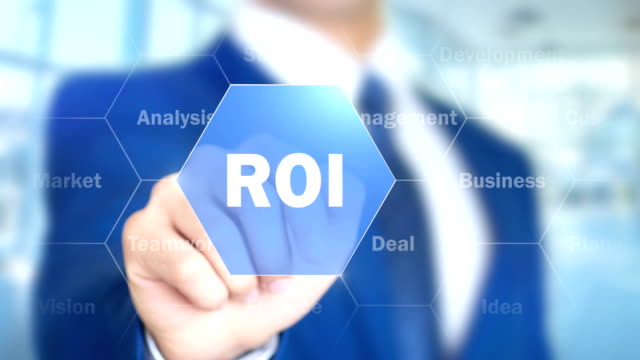 ROI,-Businessman-Using-Augmented-Holographic-Interface