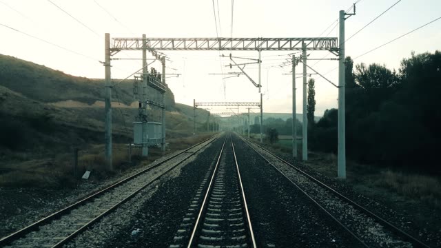 Passenger-train-moving-slowly-on-the-railroad