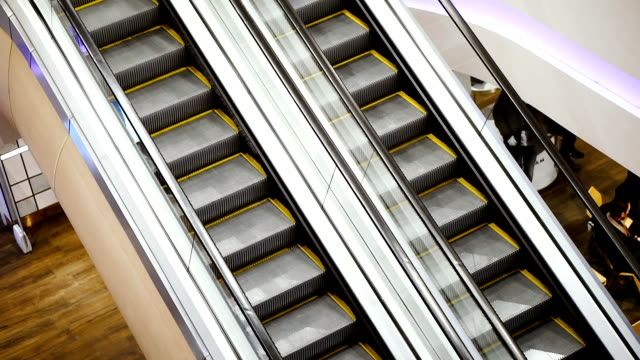 Escalator.-Steps-with-a-yellow-escalator