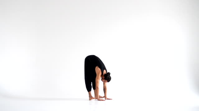 Man-practicing-yoga-asanas