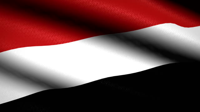 Bandera-Yemen-ondeando-textil-textura-de-fondo.-Seamless-Loop-animación.-Pantalla-completa.-Cámara-lenta.-Vídeo-de-4-K