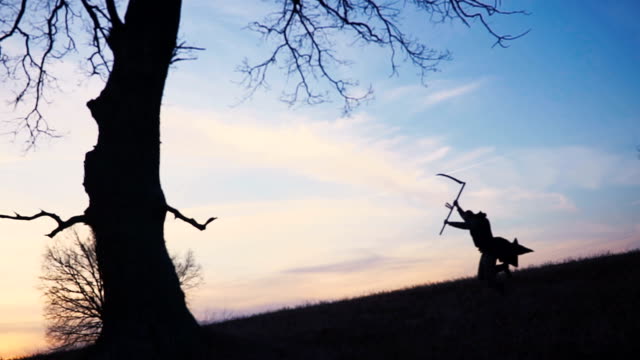 Grim-Reaper-sunset-silhouette.-concept-of-death.-Soft-focus