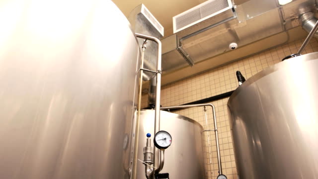 Close-up-tanks-in-brewery-warehouse.