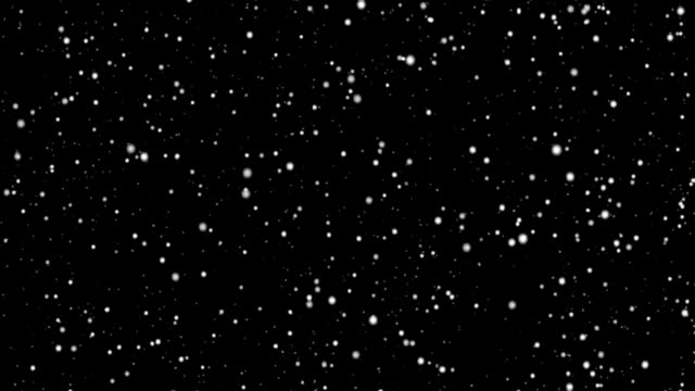 Heavy-snowfall-on-a-black-background-for-transferring-to-a-photo-or-video-of-winter-weather.-looped