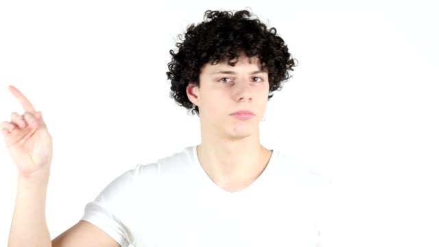 Waving-Finger-to-Reject,-Young-Man-with-Curly-Hairs,-white-Background