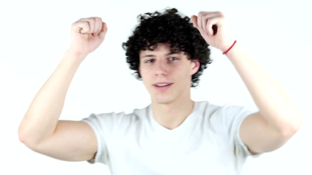 Dancing-Relaxing-Young-Man-with-Curly-Hairs,-white-Background