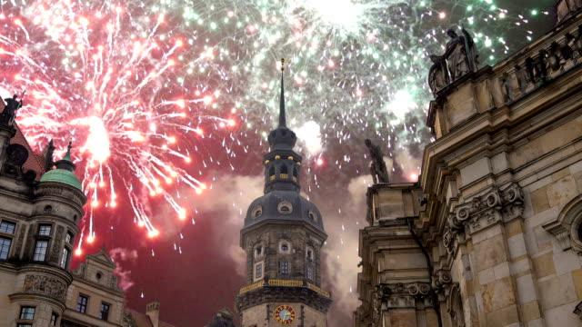 Hofkirche-or-Cathedral-of-Holy-Trinity-and-holiday-fireworks---baroque-church-in-Dresden,-Sachsen,-Germany