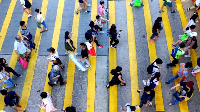 Busy-pedestrian-crossing-at-Hong-Kong---time-lapse