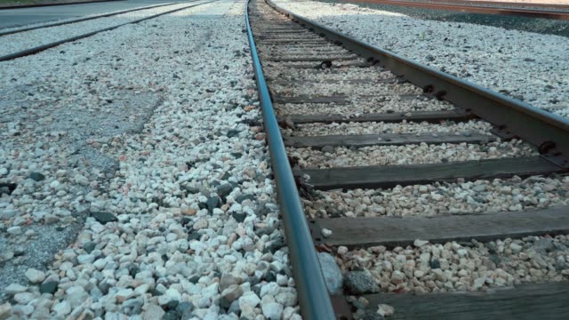 Walking-Along-Railroad-Track-Low-Angle-View-Video