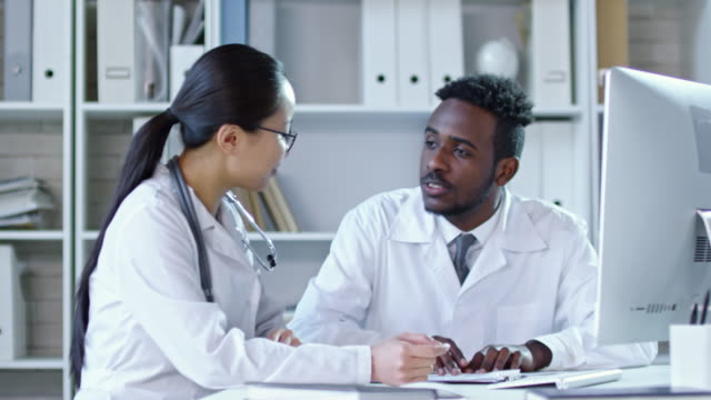 Doctors-Discussing-Medical-Research-Project