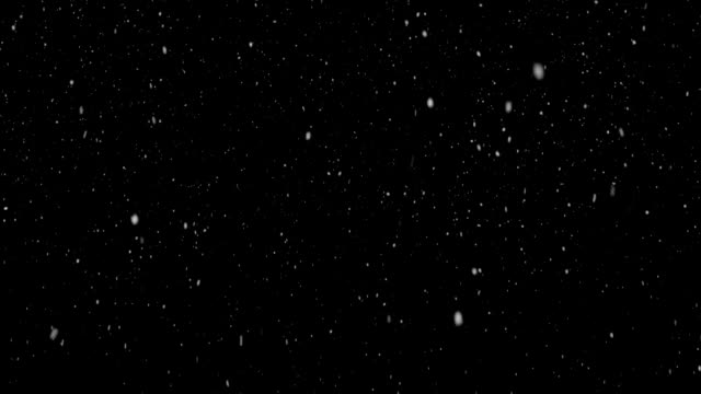 Winter-snowfall.-Uniform-fall-of-soft-snow-on-a-black-background.-looped