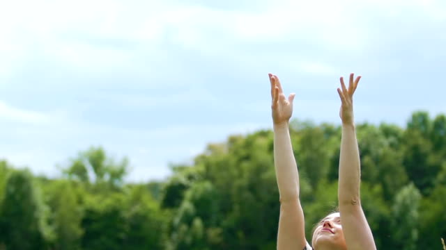 God's-prayer-with-stretched-out-hands-up-to-sky,-woman-at-nature-asks-God-help