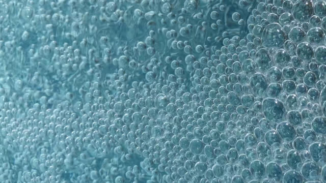 Air-Bubbles-In-Blue-Water-Background