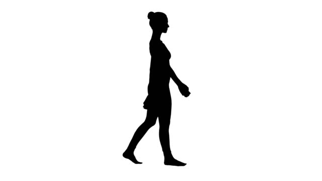 Silhouette-The-blonde-yoga-instructor-walking-and-waving-her-hands